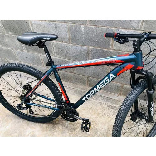 ?Bicicleta de montaña TopMega MTB Sunshine R29 L 21v Shimano Tourney TZ31 Frenos de disco mecánicos y manetas de cambio Shimano Tourney Azul claro